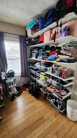 a room with lots of different colored cloths