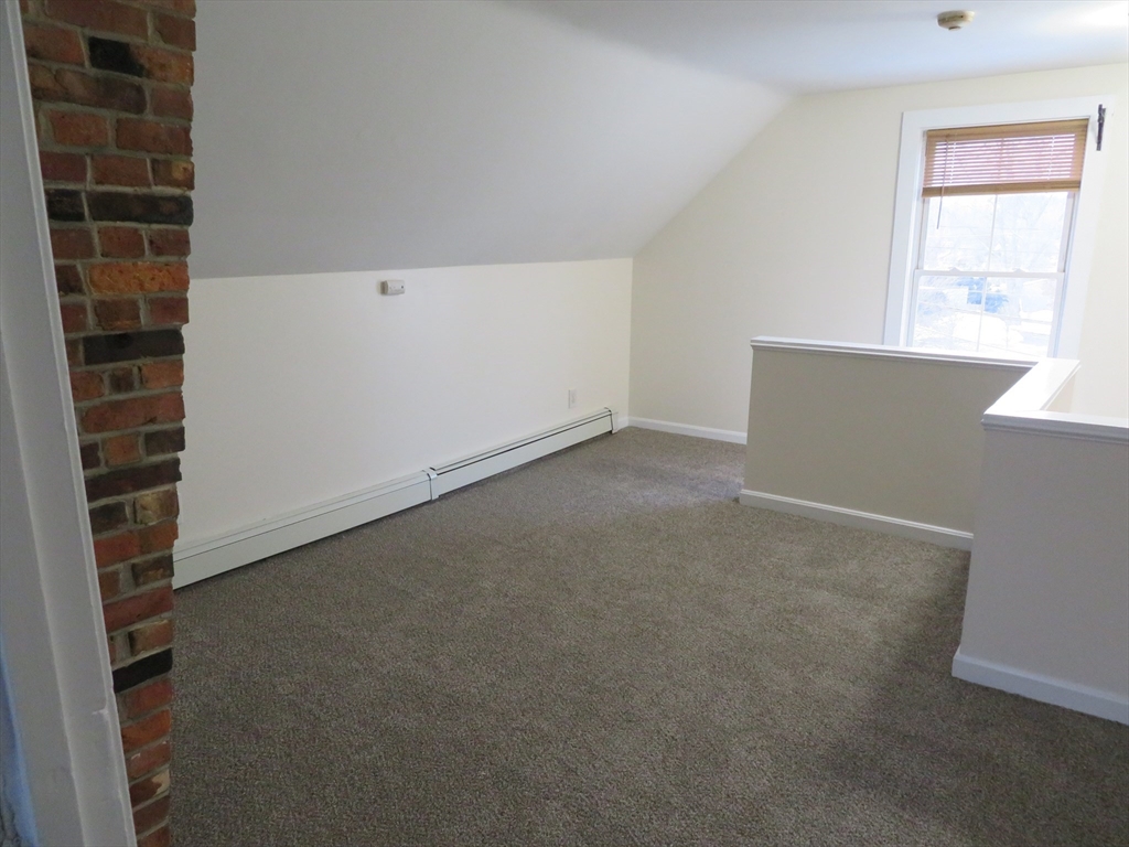 160 High Street, Unit 3 Wareham, MA 02571 - Photo 5 of 8 an empty room with a window