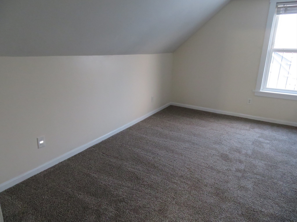 160 High Street, Unit 3 Wareham, MA 02571 - Photo 7 of 8 an empty room with a window