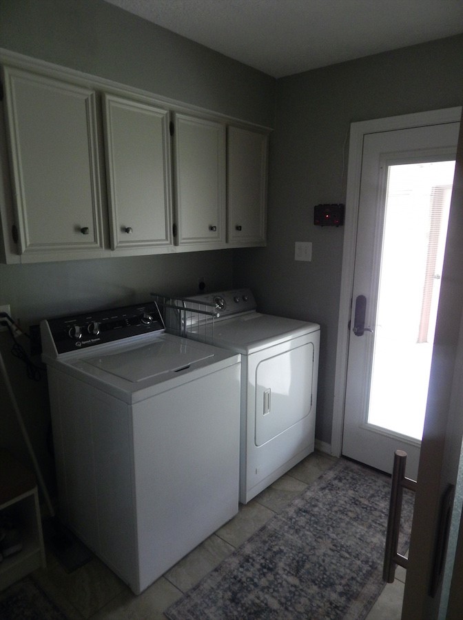 5219 Glenmere Lane Spring, TX 77379 - Photo 30 of 36 a utility room with dryer and washer