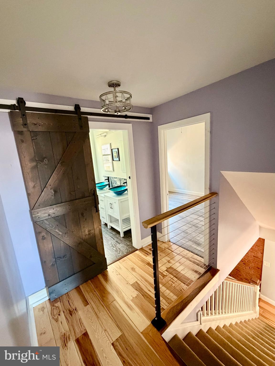1944 Palethorp Street Philadelphia, PA 19122 - Photo 8 of 14 Updates throughout hallway, sleek swinging door