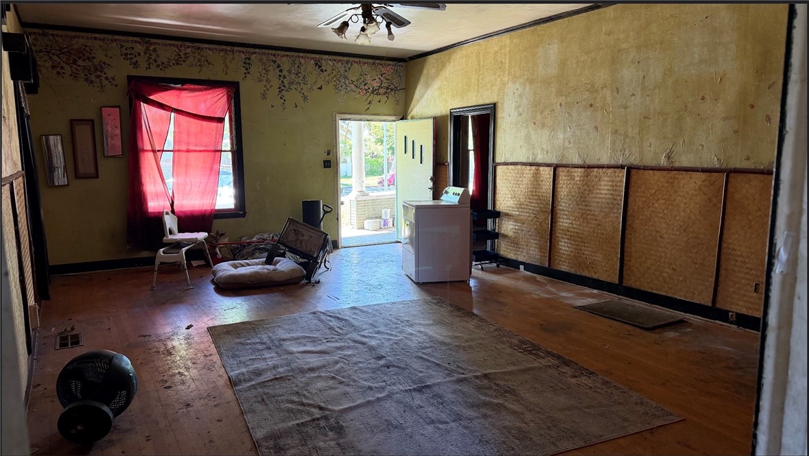 127 West 21st Street Merced, CA 95340 - Photo 3 of 5 a living room with furniture rug and a window