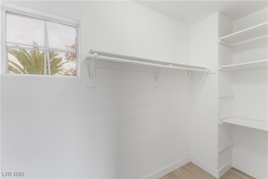 3695 Funston Way Las Vegas, NV 89129 - Photo 33 of 43 Spacious closet with light wood-style floors