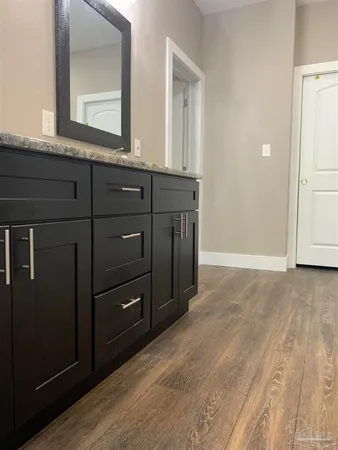 a view of a room with racks on the wall