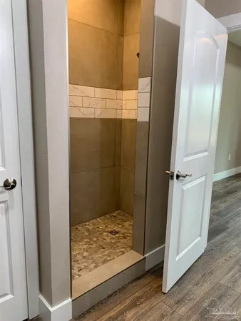 a view of a livingroom with wooden floor