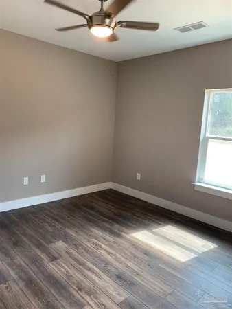 a view of small space with wooden floor