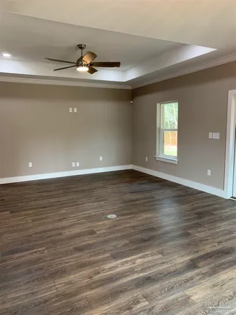 a kitchen with a sink cabinets and window