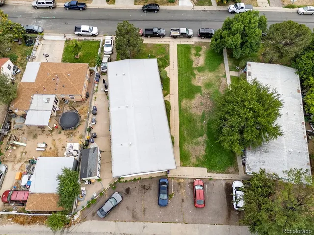 an aerial view of a house with swimming pool