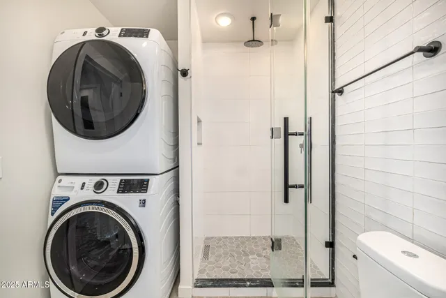a utility room with dryer and washer