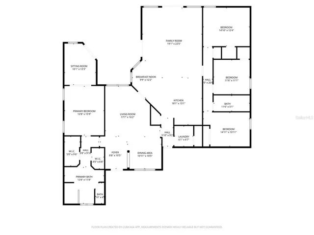 a large kitchen with kitchen island a large island a sink a window and stainless steel appliances