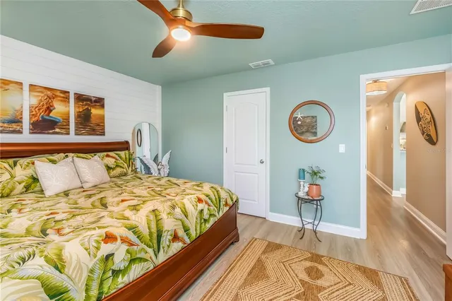 a bathroom with a bathtub and a toilet