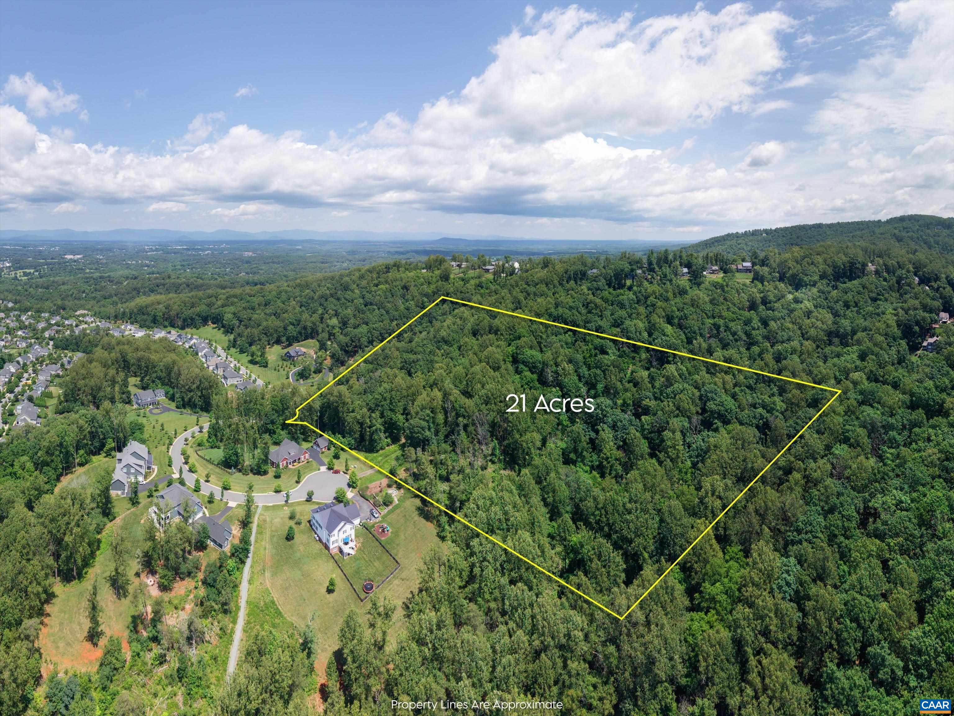 Hyland Ridge Drive Charlottesville, VA 22911 - Photo 6 of 34 a view of a city with lush green forest