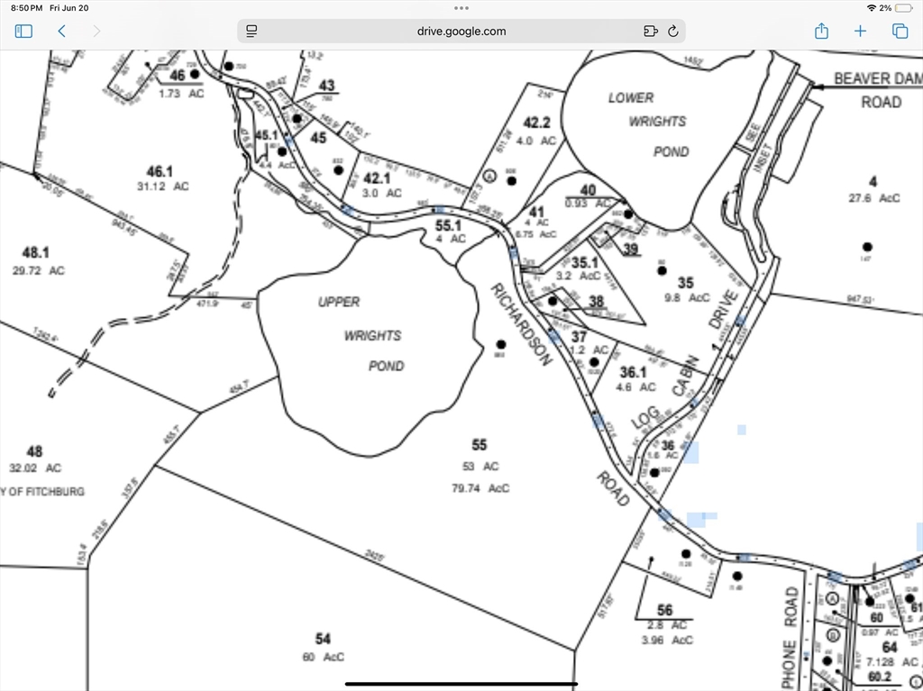 90 Log Cabin Road Ashby, MA 01431 - Photo 3 of 3 a picture of a white wall with a vase of flowers on it