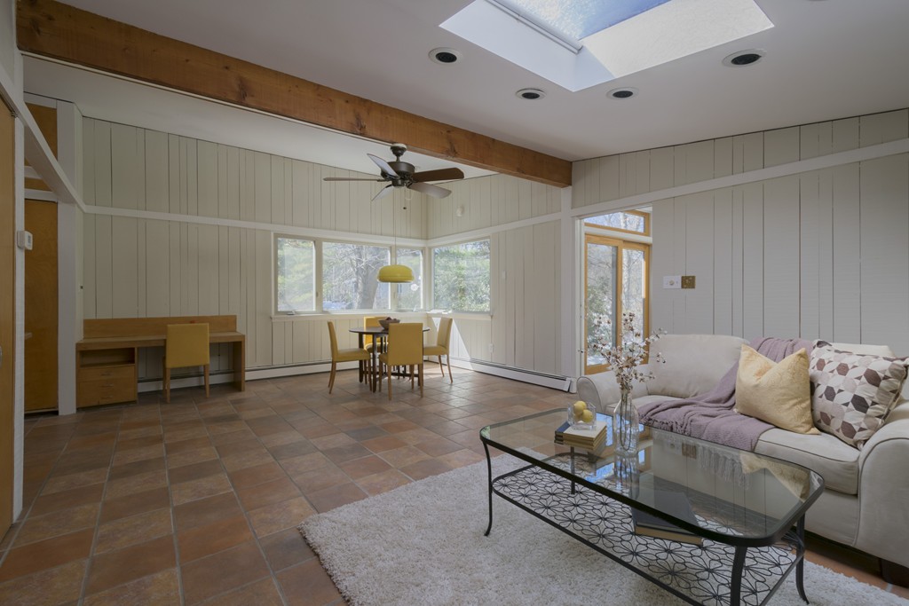 18 Peacock Farm Road Lexington, MA 02421 - Photo 13 of 30 a living room with furniture and a table