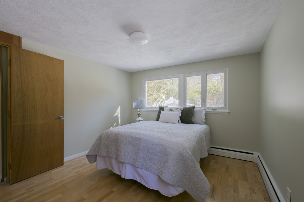 18 Peacock Farm Road Lexington, MA 02421 - Photo 25 of 30 a bedroom with a bed and window