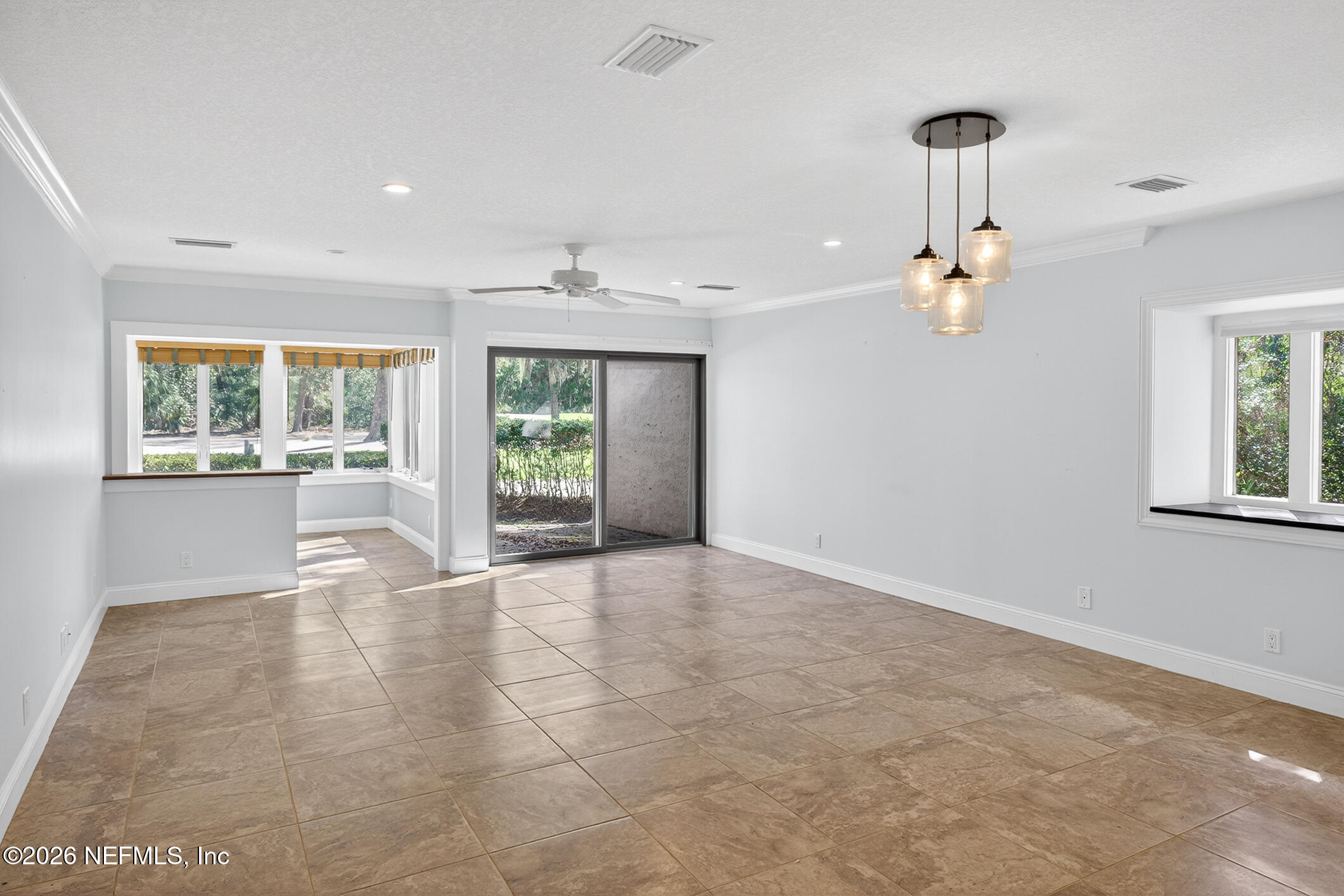 3301 Sea Marsh Road Fernandina Beach, FL 32034 - Photo 4 of 41 a view of an empty room with a window
