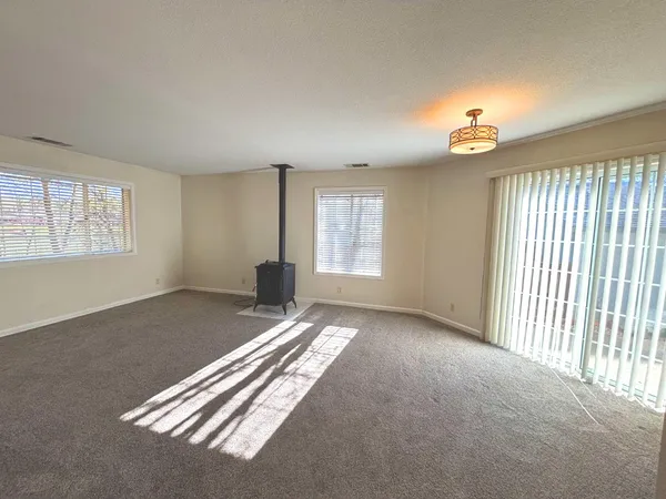 a view of empty room with windows