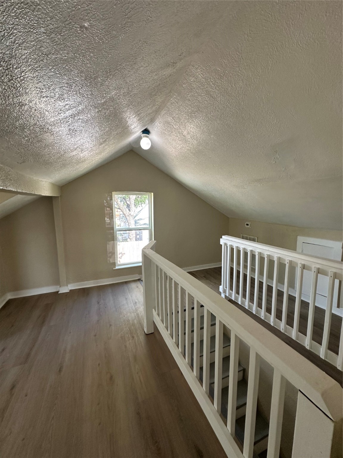 1411 Miles Street Houston, TX 77015 - Photo 12 of 14 a view of entryway with wooden floor
