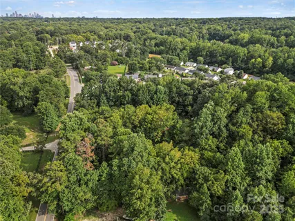 a view of a road with a yard