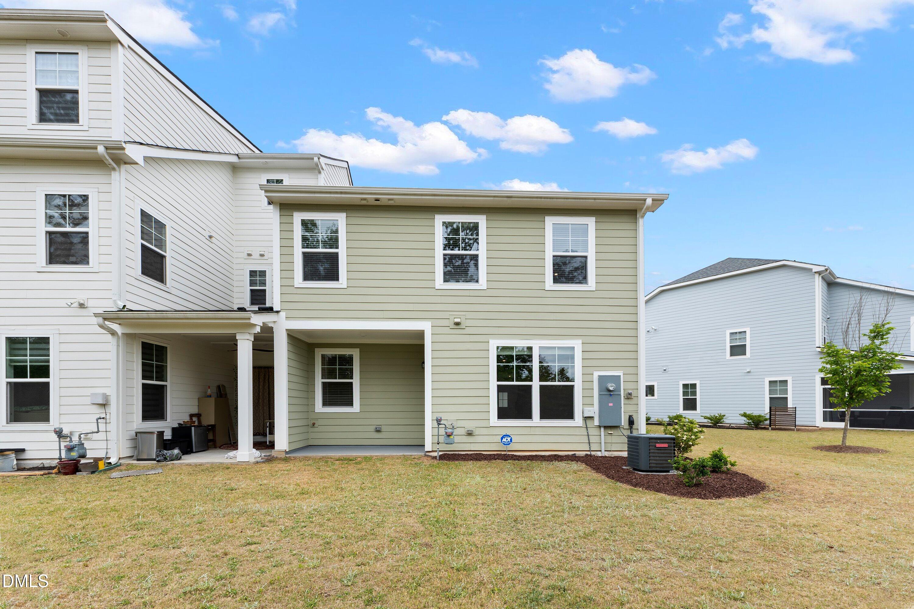 156 Sears Ridge Lane Morrisville, NC 27560 - Photo 39 of 49 a front view of a house with a yard