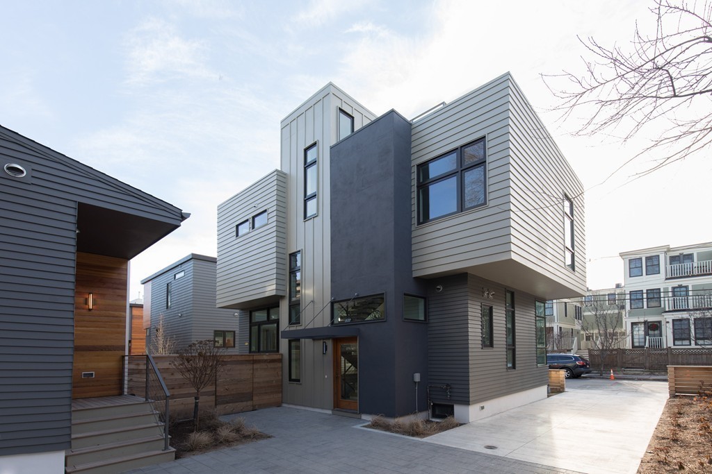 9 Decatur Street, Unit 1 Cambridge, MA 02139 - Photo 12 of 12 a front view of a building with street