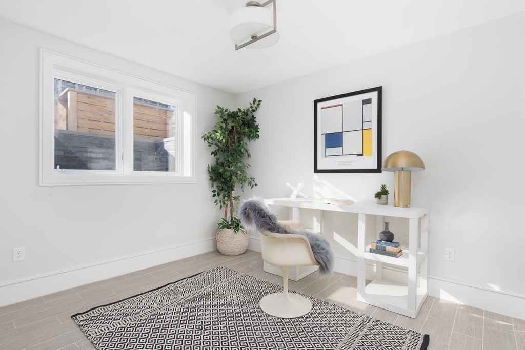 9 Decatur Street, Unit 1 Cambridge, MA 02139 - Photo 9 of 12 a bathroom with a sink and a mirror