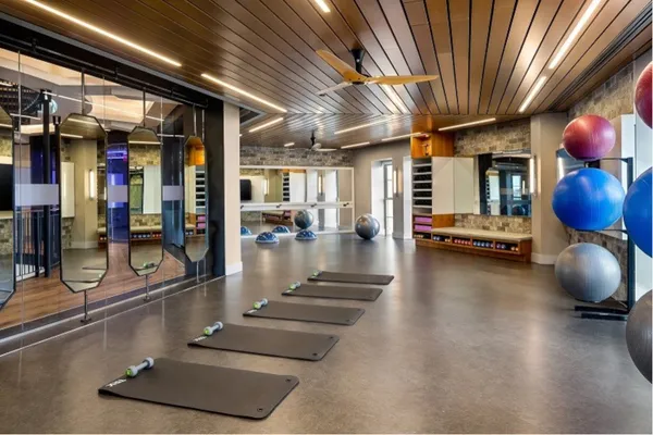 a lobby with furniture and floor to ceiling window