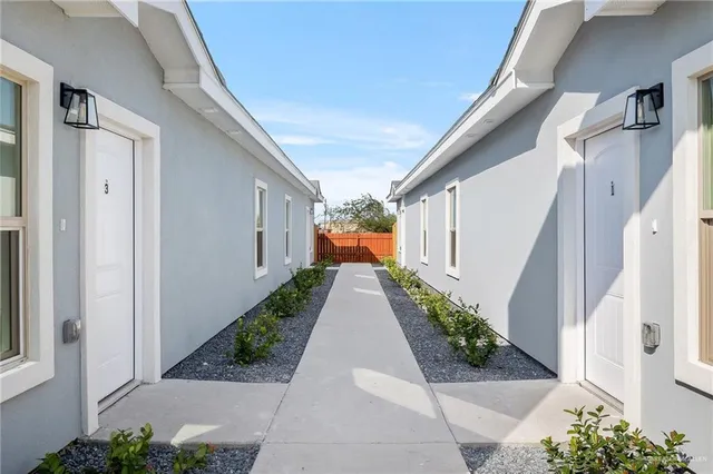 a view of entryway with flower pots