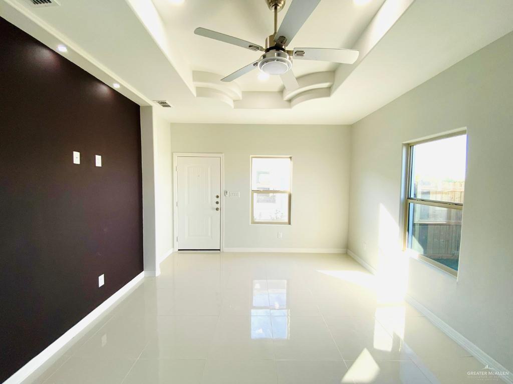209 West Rutherford Avenue, Unit 4 Edinburg, TX 78541 - Photo 9 of 14 a view of an empty room with a window
