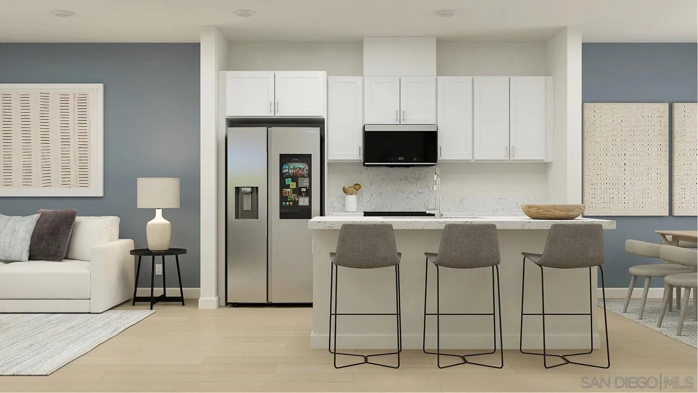 1612 Mountain Laurel Road San Marcos, CA 92078 - Photo 2 of 5 a kitchen with cabinets a sink and a stove