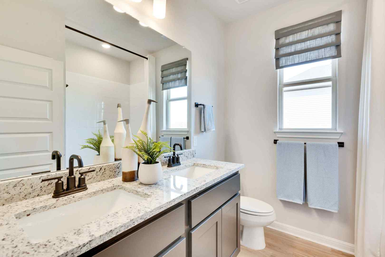 1205 Lavender Way Georgetown, TX 78628 - Photo 9 of 14 Double vanity with ample counter space creates a serene and practical bathroom.