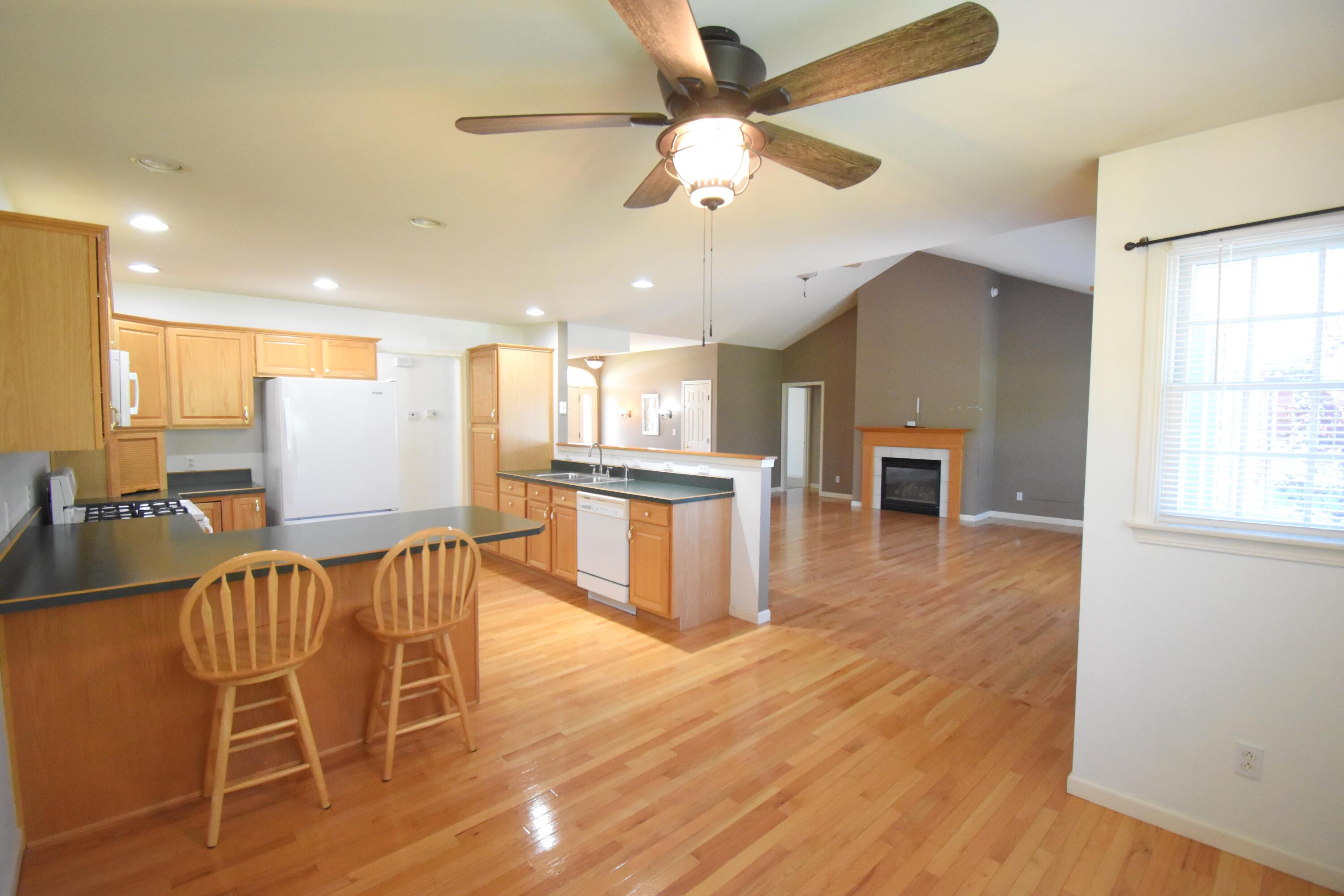522 Pheasant Run Rensselaer, IN 47978 - Photo 26 of 55 a view of kitchen with furniture and wooden floor
