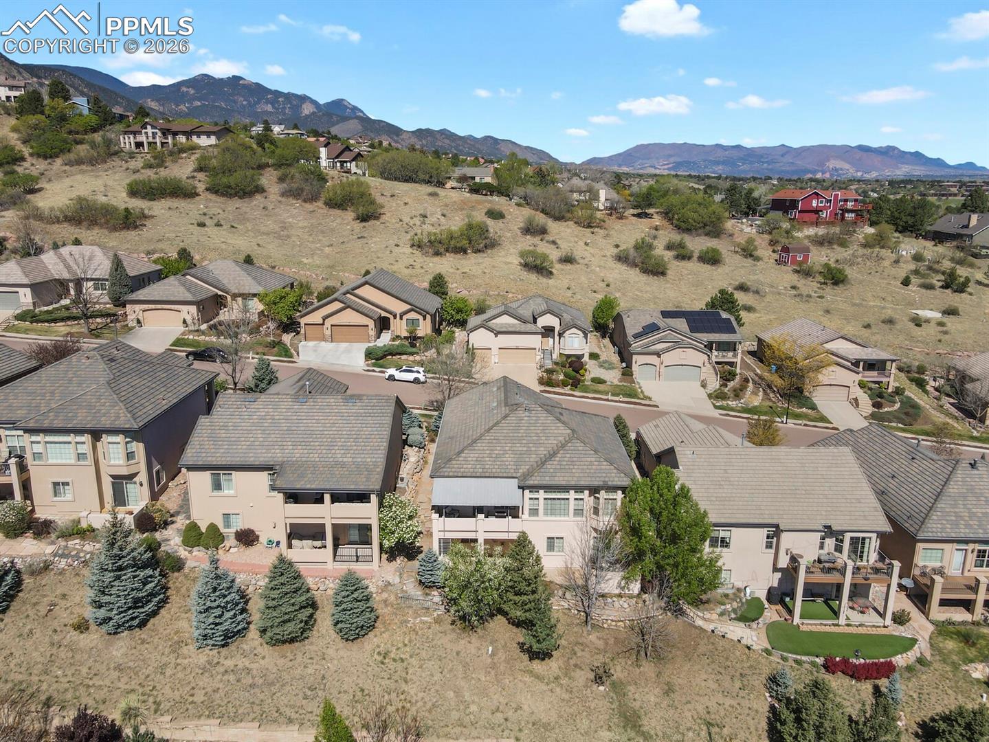 617 Concerto Drive Colorado Springs, CO 80906 - Photo 42 of 46 Showing the exterior/rear of the property and featuring neighborhood and mountain views