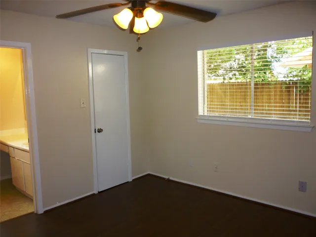 a bathroom with a sink and a window