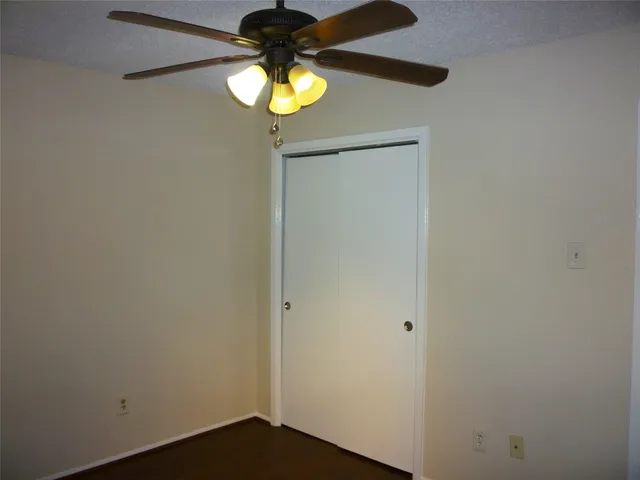 a bathroom with a toilet a sink and bathtub