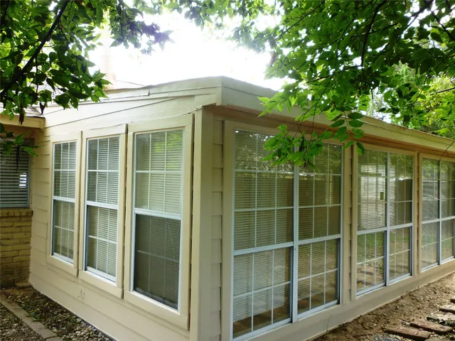 a view of backyard with green space