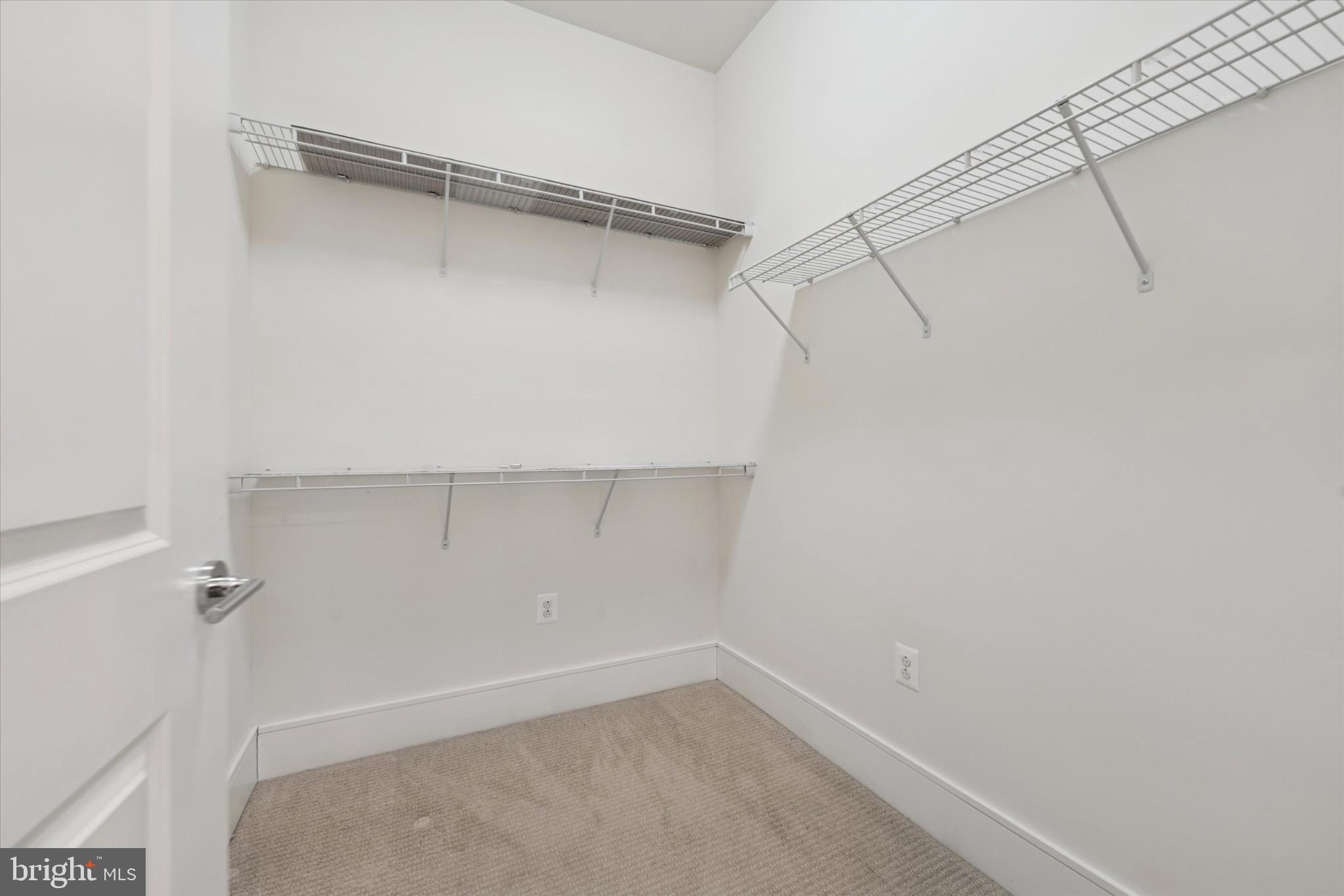 410 South Front Street, Unit 313 Philadelphia, PA 19147 - Photo 12 of 24 a view of a room with racks on the wall