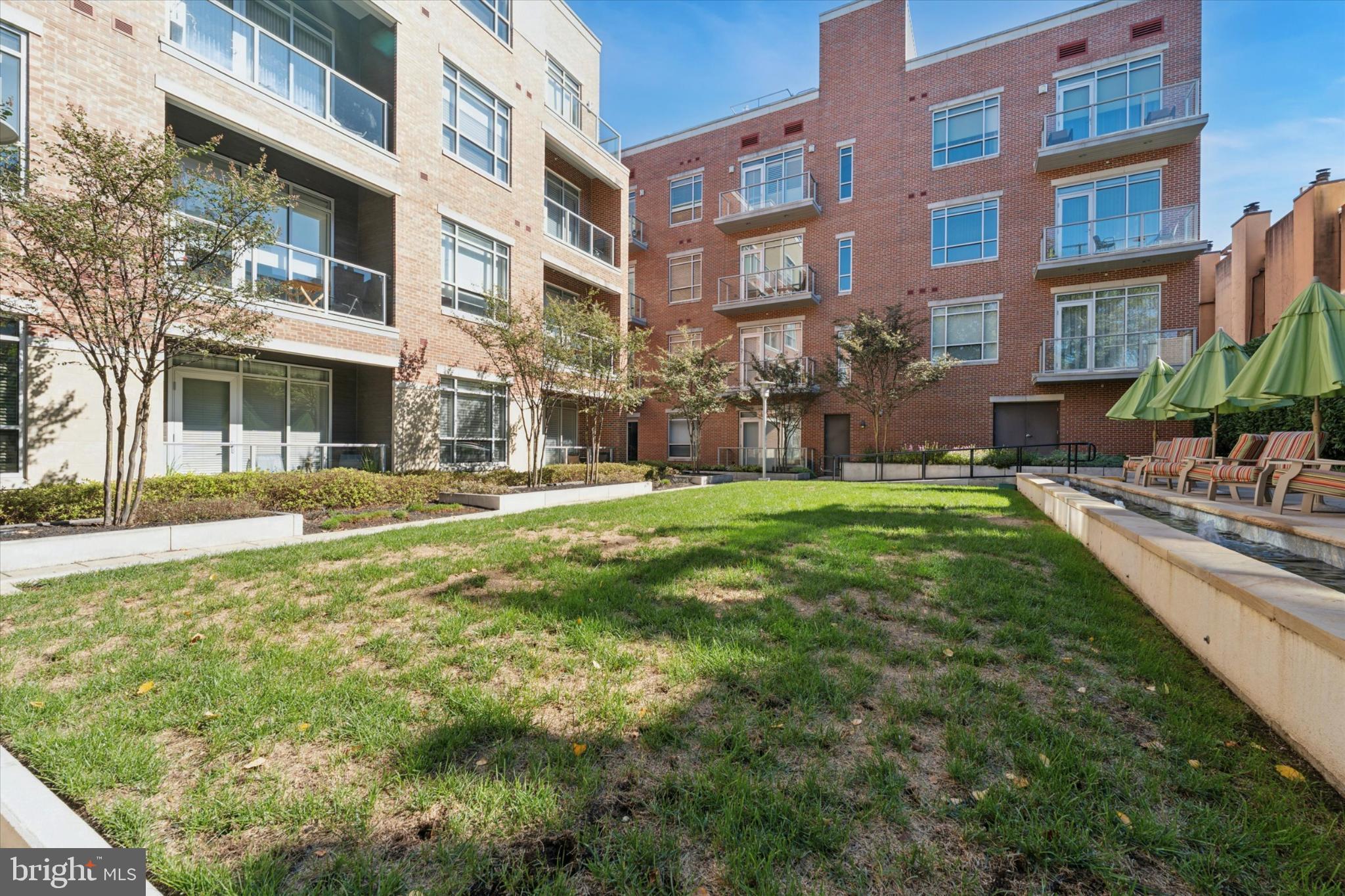 410 South Front Street, Unit 313 Philadelphia, PA 19147 - Photo 19 of 24 a view of a building with a yard