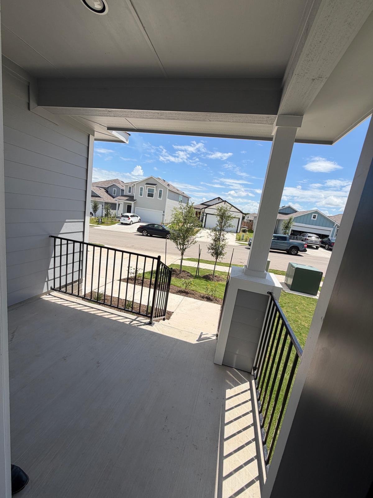 2612 Towy Road Manor, TX 78653 - Photo 5 of 35 A welcoming front porch offers a pleasant neighborhood outlook.