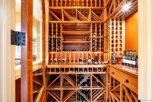 a view of a kitchen with a sink and cabinets