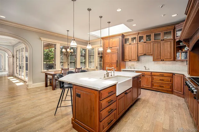 a shelf with books and knick knacks on it
