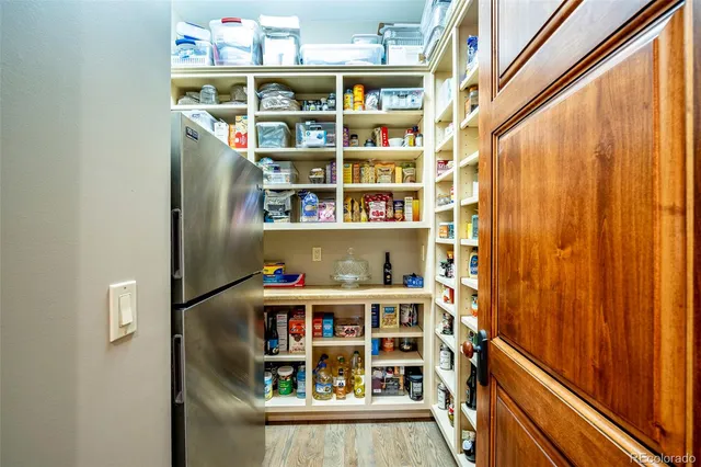 a living room with furniture a window and a fireplace