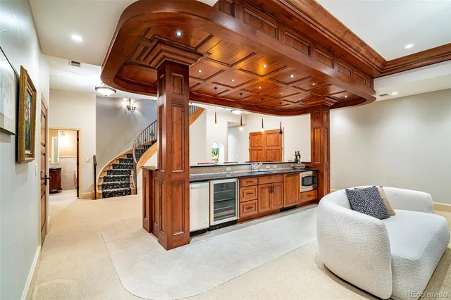 a dining room with a table and chairs in it