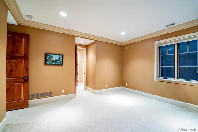 a bathroom with a granite countertop sink mirror and double