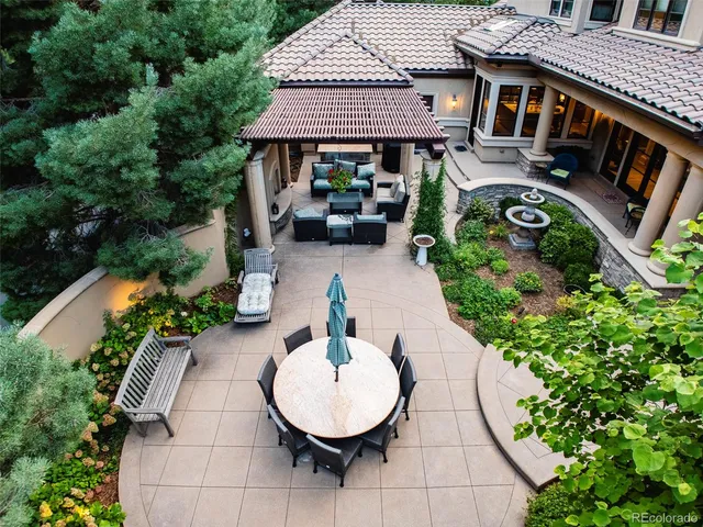 an aerial view of a house having patio