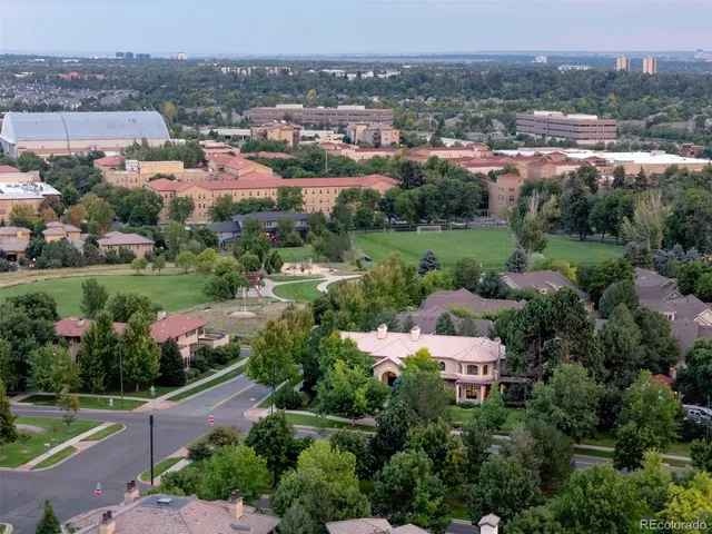 an aerial view of a city with lots of residential buildings