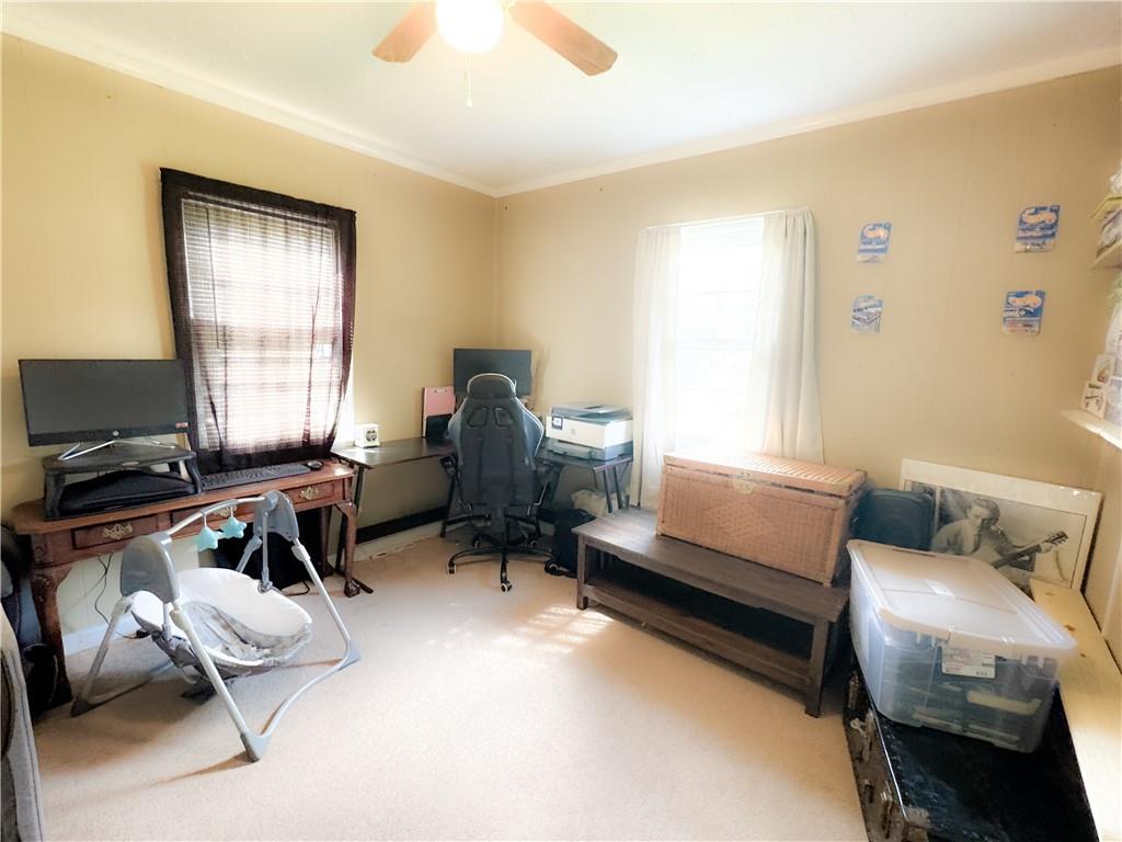 225 Jasper Street Fairmount, GA 30139 - Photo 11 of 15 a living room with furniture and a window