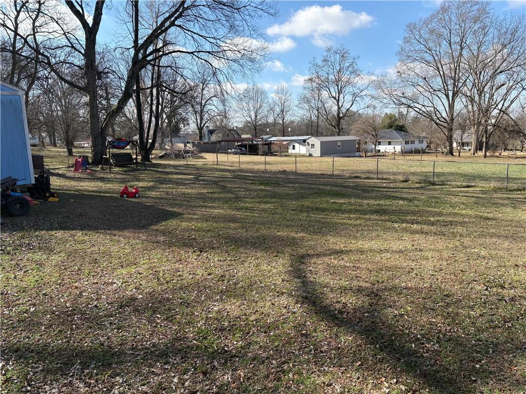 225 Jasper Street Fairmount, GA 30139 - Photo 14 of 15 a fire hydrant in the middle of a field