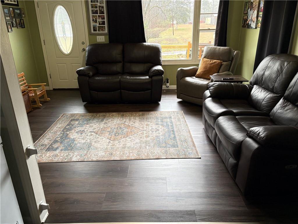 225 Jasper Street Fairmount, GA 30139 - Photo 3 of 15 a living room with furniture and a large window