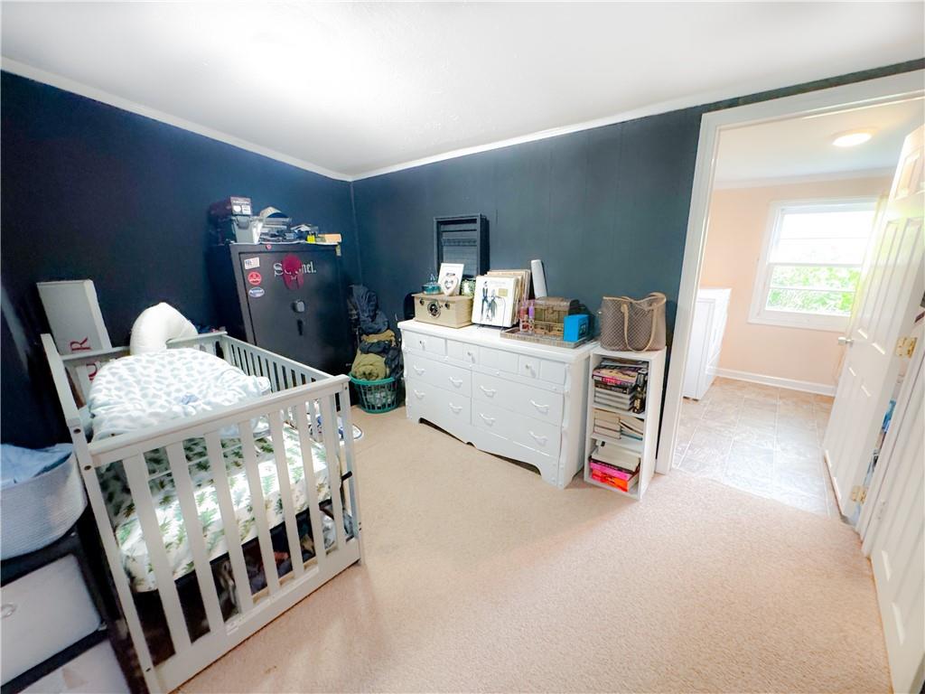 225 Jasper Street Fairmount, GA 30139 - Photo 9 of 15 a view of a dining room with furniture window and wooden floor